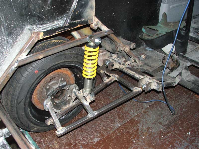 Swing arms & rear suspension construction · Jaguar remote water pump